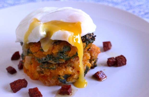 Butternut squash and kale fritters, with chorizo and poached egg